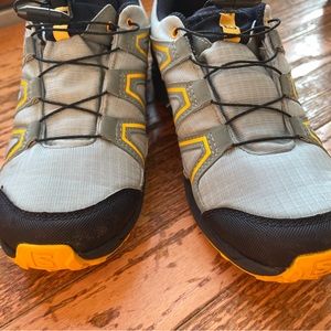 Excellent condition boys Salomon sneakers. Waterproof, great traction on sole.